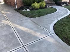 Stamped concrete has become a popular choice for modern homeowners as well as commercial property owners. This style of decorative concrete involves a process of imprinting wet concrete to achieve the desired style/aesthetic. We guarantee that we will provide the best quality stamped concrete and will achieve the look you are hoping for on your back patio, pool deck, driveway, or wherever you would like stamped concrete installed. We pride ourselves on being one of the top concrete contractors Canton OH. Get in touch with us today for a free estimate on your project! 