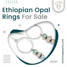Silverhub Jewelry's online site sells Ethiopian opal rings, which together make up a beautiful collection of rings showcasing Welo Opals. The stunning color play of Ethiopian opal engagement ring contributes to the hydrophane opal's rising recognition among jewelry fans and continues to inspire our imaginative designs for Ethiopian opal rings for sale . Our ability to effectively construct remarkable Ethiopian opal rings for ladies is a result of our strong eye for small details and exquisite gold decorations.
