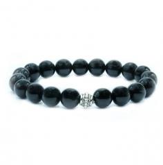 This Natural Stone bracelet features a deep black protective stone known for shielding against negative energy. It is available in two styles, measuring 19 cm and 19.5 cm, suitable for a wrist size of 18. The beads come in two sizes: 8 mm and 10 mm, and there are different bead counts to choose from, including 19, 22, and one variant with 22 beads along with a Buddha charm. The beads are rounded in shape, and the bracelet is made with an elasticated rope for easy wearing.

This glorious stone holds immense power and provides protection against negative influences. It serves as a grounding force, helping to anchor you to the present moment and providing a sense of stability. Additionally, it facilitates deep-set healing, assisting in the process of uncovering truths and tearing away the veil of falsehood.

Wearing this Natural Stone bracelet not only adds a touch of elegance to your attire but also serves as a powerful talisman for power, protection, and deep healing. Please note that while gemstones have been attributed with certain properties, their effectiveness is subjective, and they should not replace professional advice or treatment.