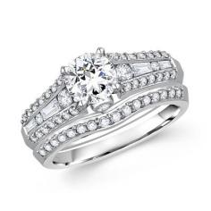 This stunning cathedral bridal set features round diamond in 14K white gold.