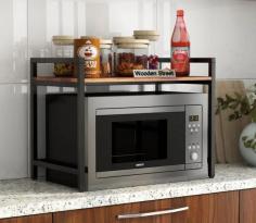 "This image showcases a stylish and practical microwave stand from Wooden Street. Designed to enhance the functionality of your kitchen, this sleek stand offers a perfect solution for organizing your microwave and kitchen essentials in one place. The stand features a sturdy wooden construction, ensuring durability and stability. With its spacious countertop, open shelves, and additional storage cabinet, this microwave stand provides ample space for keeping your cookware, utensils, and other kitchen items within easy reach. The elegant design and versatile color options make it a seamless fit for any modern kitchen decor. Upgrade your kitchen with this elegant microwave stand and enjoy the convenience of a clutter-free cooking space.
Visit- https://www.woodenstreet.com/microwave-stand"