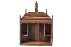 A 2 square feet Temple made out of Teakwood with a pullout shelf at the bottom. It has 2 side sections for storage of religious books/ accouterments and a midsection for Statues/ portraits of Gods/Goddesses. Adorned with spotlights inside to give it a well lit festive look, this is a wall-mounted product. https://shorturl.at/fpA46