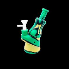 Delusion Smoke presents the perfect blend of portability and performance with our Small Silicone Bong. Compact and unbreakable, this little powerhouse is designed to deliver big, smooth hits on the go. Crafted from high-quality, heat-resistant silicone, it can withstand the rigors of an active lifestyle while ensuring an enjoyable smoking experience. Ideal for those who value discretion without compromising quality, our Small Silicone Bong is your trusty companion for elevated moments wherever you are. Say goodbye to bulky alternatives and welcome the convenience of Delusion Smoke's Small Silicone Bong into your collection today.