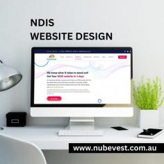 The image depicts a laptop screen displaying the homepage of NubeVest's website (nubevest.com.au). The website features a clean and modern design with a muted color palette. A prominent header showcases the NubeVest logo and navigation menu, while below, engaging imagery and concise text highlight the services offered by the NDIS provider.  https://nubevest.com.au/ndis-website-design-service/