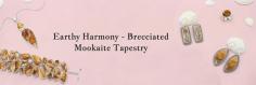Brecciated Mookaite Tapestry: Harmonious Weaving of Earth's Colors

Brecciated Mookaite is characterised by its glossy opaque appearance, complemented by translucent borders and a delicate matrix of fine lines. This matrix, highly coveted, contributes to a mosaic of colors ranging from mustardy yellow to soft whites and light browns within the stone. Originating from Australia, Mookaite is a type of jasper that blends lighter hues of yellow and red jasper. It fosters a desire for new experiences and facilitates a harmonious balance between external engagements and internal responses. Infusing a profound sense of tranquility, it also promotes adaptability.