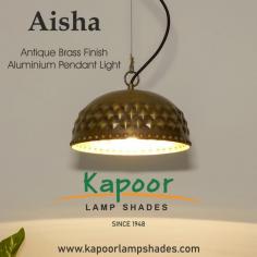 The Aisha Antique Brass Aluminium Pendant Light is a stylish lighting fixture designed to add elegance and character to any space. With its antique brass finish and aluminium construction, it exudes a vintage charm while also offering durability.