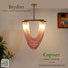 Transform your living space with the exquisite Brydon Copper Chains Ceiling Pendant Light. This elegant fixture combines industrial charm with contemporary style, making it the perfect centerpiece for any room. It will bring a touch of luxury and warmth to your home.