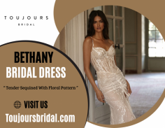 Find Your Perfect Wedding Dress

Romantic sheath sparkling semi-transparent wedding gown on sequined straps. Our gown is embellished with a tender sequined floral pattern, a sweetheart corset with lace-up closure on the back, a midi train, and a wrapped skirt with a daring front slit. Send us an email at info@toujoursbridal.com for more details.