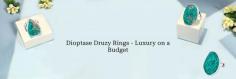 Style On A Budget: Affordable Dioptase Druzy Rings That Look Luxurious

Dioptase druzy is used to make a wide range of jewelry including Dioptase druzy rings, pendants, earrings, and bracelets because this gemstone is very trendy and wearable. The beautiful vibrant color of this gemstone goes well along with other white gemstones, and almost all precious metals fit together well with dioptase druzy. The only drawback in purchasing dioptase druzy jewelry is, that since the dioptase druzy gemstone is brittle in nature, it is not available in a large number of gemstone settings. Most of the dioptase druzy rings that you will find in the market will be in a bezel setting or prong setting.