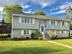 Experience coastal living in this charming oceanfront cottage, featuring direct beach access, stunning sea views, and cozy, rustic decor. This rental is perfect for a relaxing beach getaway.