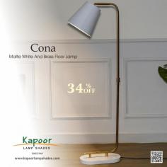 Introducing the Cona Matte White and Brass Floor Lamp, the perfect blend of modern design and timeless sophistication. The sleek matte white finish combined with luxurious brass accents creates a timeless look that complements any decor. Whether in your living room, bedroom, or office, this floor lamp adds a touch of elegance while providing optimal lighting.