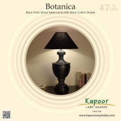 Illuminate your home with the elegance of the Botanica Black Finish Wood Table Lamp! Add a touch of sophistication to any room with this stunning lamp. The Botanica lamp is the perfect blend of modern style and timeless charm. Ideal for living rooms, bedrooms, or offices, it brings warmth and refinement wherever it goes.