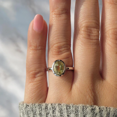 Add a touch of subtleness with this dainty lemon quartz ring. The soft, lemony color of the lemon quartz gemstone exudes a timeless elegance, making it an ideal accessory for any occasion. Set meticulously in a dainty band of 925 sterling silver, this ring blends classic elegance with a contemporary allure that helps indulge in the enchanting charm of this dainty lemon quartz ring that exudes a quiet elegance.