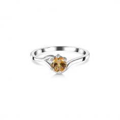 Dazzle in the warmth of this dainty citrine ring. The sunny golden colors of citrine radiate positivity and joy, making it a perfect accessory to brighten any look. Delicately set in 925 sterling silver, this citrine ring exudes a timeless charm and modern elegance. Embrace citrine's uplifting energy and vibrant beauty, and add a touch of sunshine with this captivating, dainty citrine ring.
