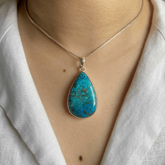 Discover how magically beautiful the Sagacia Shattuckite jewelry is. This jewelry, which is crafted out of pure 925 sterling silver (which is also hypoallergenic in nature) and is plated with rhodium vermeil showcases the vibrant green and blue patterns of 100% natural and genuine Shattuckite. As a gemstone, Shattuckite is renowned for boosting psychic abilities and bringing physical healing to the individual, and this stone is a stone of inner insight and mental clarity. Sagacia's Shattuckite jewelry is perfect for anyone who wishes to shorten the path of his spiritual journey, and this jewelry will also add a touch of unique elegance to the outfit you wear it with. So, purchase Sagacia's Shattuckite jewelry and explore the world with this enchanting beauty.