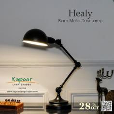 Featuring a sleek black finish and adjustable arm, the Healy Black Metal Desk Lamp is perfect for adding a touch of modern elegance to any workspace. Add a touch of contemporary elegance to your desk and stay productive day or night. It is ideal for home offices, study areas, and creative spaces.