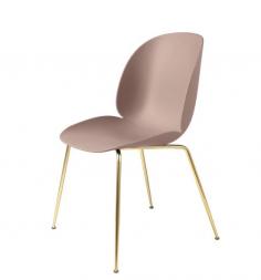 The Beetle Chair’s durable outer shell is a continuous, curved form, reminiscent of the strong and graceful contours of the insect that inspired it. Despite its robustness, it is designed to gently flex, providing comfort even after prolonged sitting, making it ideal for dining and meetings. Sleek and elegant conical metal legs add an overall lightness to the design, accentuating the ‘beetle’ aesthetic.