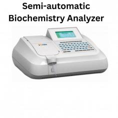 Zimed semi-automatic biochemistry analyzer supports assay methods including kinetics, bi-chromatic, end-point, differential, fixed time, and multi-standard. It handles aspiration volumes from 200 µl to 2000 µl, features a 32 µl flow cell, and operates with 7 standard filters plus 1 additional filter position.
