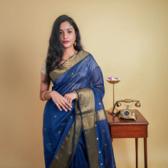 Experience the stunning elegance of our Ink Blue Silk Maheshwari Saree at Anilaa. Made from a soft cotton-silk blend, this beautiful saree is a perfect mix of tradition and style, suitable for any event. The deep ink blue color adds to its charm, and the detailed patterns showcase the amazing skill of Maheshwari weaving. Whether you’re going to a wedding, a festival, or a special gathering, this saree will help you shine. Upgrade your wardrobe with this gorgeous piece that represents grace and sophistication. Don’t miss out—shop now and celebrate the beauty of Indian craftsmanship!