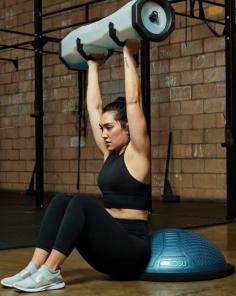 A Bosu Ball is a versatile piece of fitness equipment designed to enhance balance, stability, and strength. This half-sphere, with a flat platform on one side, offers a range of workouts that target multiple muscle groups, making it a favorite among athletes and fitness enthusiasts alike. The Bosu Ball can be used in numerous exercises, such as squats, lunges, planks, and core workouts. By adding an unstable surface, the Bosu Ball forces your body to engage more muscles to maintain balance, which leads to improved core strength and overall stability. For example, performing squats on a Bosu Ball challenges your lower body and core, providing a more intense workout than standard squats on a flat surface. Not only does the Bosu Ball improve physical balance and coordination, but it also contributes to better proprioception the body’s ability to sense its position in space. This benefit makes the Bosu Ball ideal for athletes working to enhance their agility and coordination or individuals recovering from injury who need to restore stability and strength safely. If you're interested in incorporating a Bosu Ball into your fitness routine, check out the selection at Fitness Warehouse. Their online store offers a range of balance equipment, including Bosu Balls, that cater to various fitness needs and levels. Fitness Warehouse provides high-quality equipment for both beginners and experienced athletes, ensuring durability and reliability in every workout session. Whether you're aiming to tone your core, boost stability, or simply diversify your workouts, a Bosu Ball is a great investment. Discover how this innovative tool can elevate your exercise routine and help you achieve your fitness goals at Fitness Warehouse.