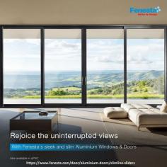 Experience uninterrupted views with Fenesta's slim and stylish Aluminium Windows & Doors. These modern slimline sliders seamlessly combine elegance, durability, and functionality. Let in abundant natural light while enhancing your space with sleek, contemporary designs. Transform your home with Fenesta's innovative solutions!. Visit https://www.fenesta.com/door/aluminium-doors/slimline-sliders