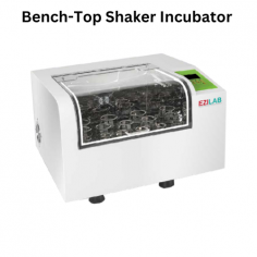 Ezilab Bench-Top Shaker Incubator ensures precise temperature control from RT +5°C to 60°C and consistent shaking at 20-300 rpm. Its durable stainless-steel chamber, UV sterilizer, LCD display, and auto-restart offer reliability, hygiene, and ease for seamless lab operations.