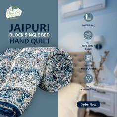 Snuggle up in cozy comfort with our Jaipuri Block Single Bed Hand Quilt (Razai)  Handcrafted with love, this reversible quilt is made from pure mulmul cotton and filled with 1 kg of pure cotton, making it super soft and warm for those chilly nights! 
Add a touch of tradition to your home with special hand tagai quilting all over the razai. Perfect for your single bed! 
Price: ₹1690/- (including shipping)
Weight: Approx. 2 kg


