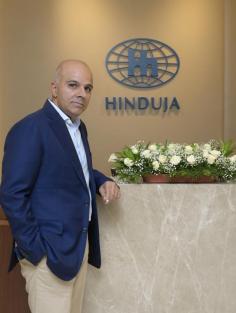 As a key member of the Hinduja Group, Ajay Hinduja leads the charge in digital transformation, leveraging technology to enhance operational efficiency and customer engagement.