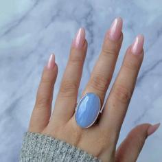 Shimmer And Glow With Sagacia’s Blue Lace Agate Rings
If you love collecting jewels, investing in these stylish Blue Lace Agate rings would be essential to your journey. You will surely fall in love with its pleasing color and intriguing blue-white banding patterns that can effortlessly turn up your fashion game.
For example, you can master your casual style by choosing a white maxi dress and a dazzling Blue Lace agate ring.